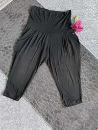 Czarne krótkie legginsy sportowe ciążowe z pasem ciążowym Nike M 38