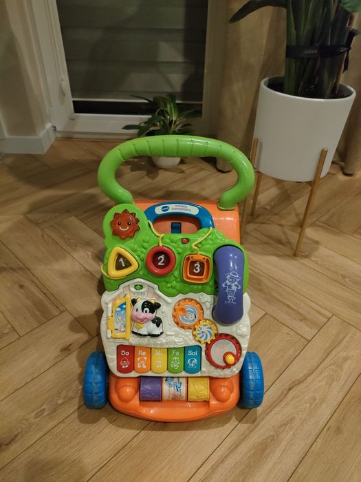Pchacz gawędziarz vtech chodzik jeździk do chodzenia Fischer Price