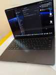 Apple MacBook Pro 14.2" M3 Pro, 18GB RAM, 512GB SSD.
