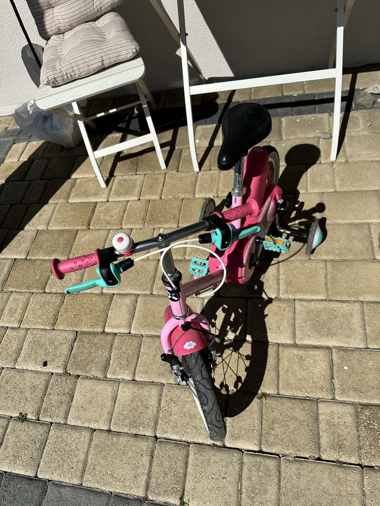 Rowerek Unicorn Dacathlon z kółkami bocznymi
