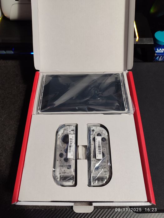 Nintendo Switch V2 – Vermelha/Azul + Skins + Vários Acessórios