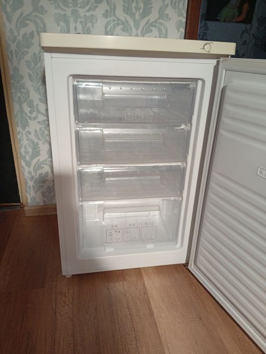 Морозильна камера .