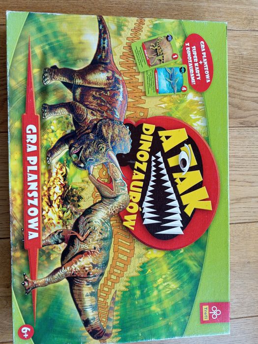 Atak dinozaurów. Gra planszowa. Trefl