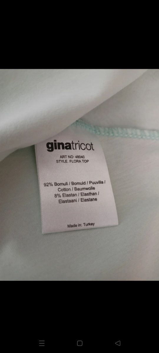 Miętowa jasnozielona bluzka z baskinką Gina Tricot L XL