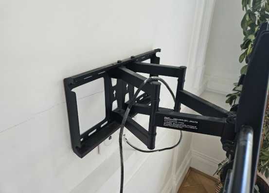 Кріплення для телевізора на стіну