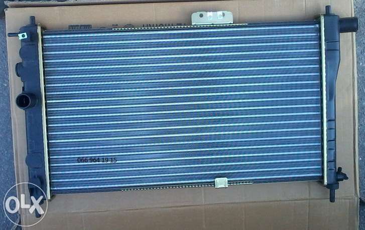 Радиатор охлаждения Daewoo Nexia (96144847) Дэу Нексия 1,5 8Vи16V