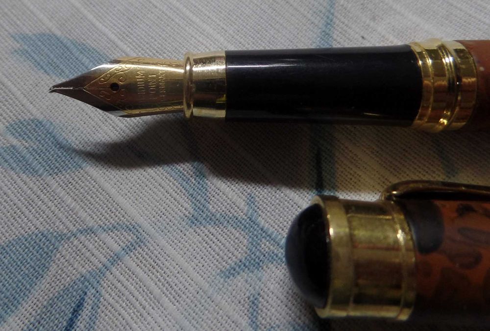 Conjunto de 2 canetas mais 1 abre cartas (69)