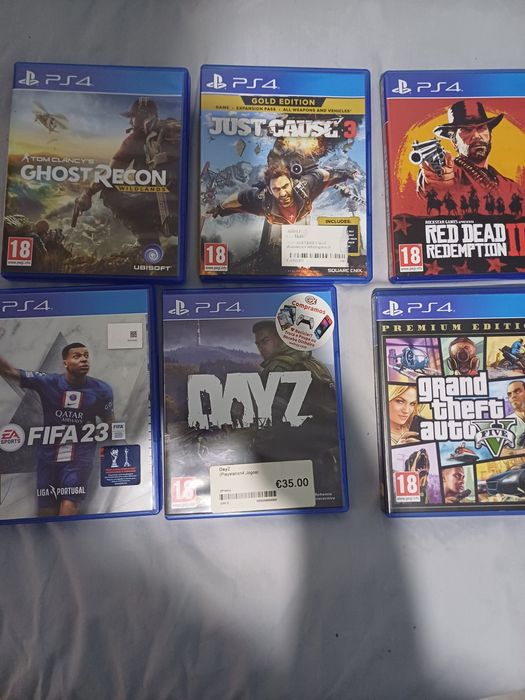 Playstation 4 com comando e 6 jogos