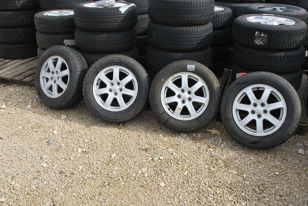 Koła 195/65 R15 5x100 Oryginalne alufelgi +opony zimowe Subaru Impreza