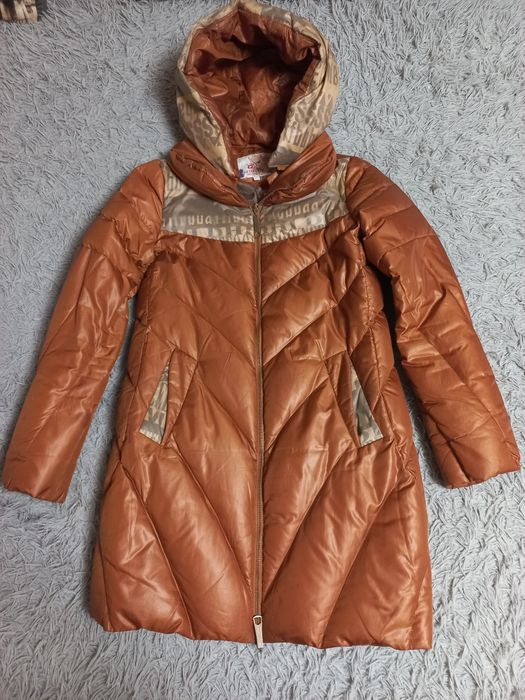 Продам натуральний пуховік в ганому стані