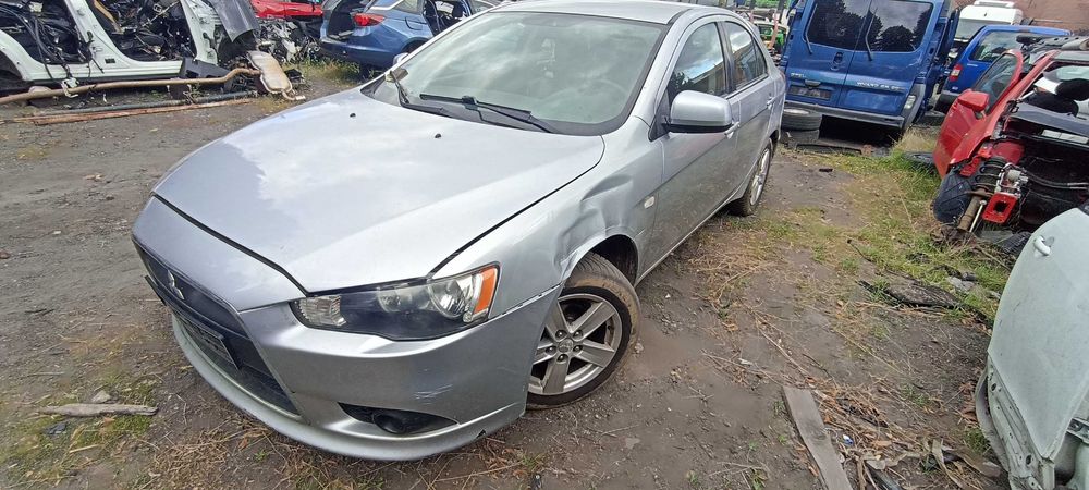 ćwiartka tył tylna mitsubishi lancer 1.8 4b10 140 km  lak A31