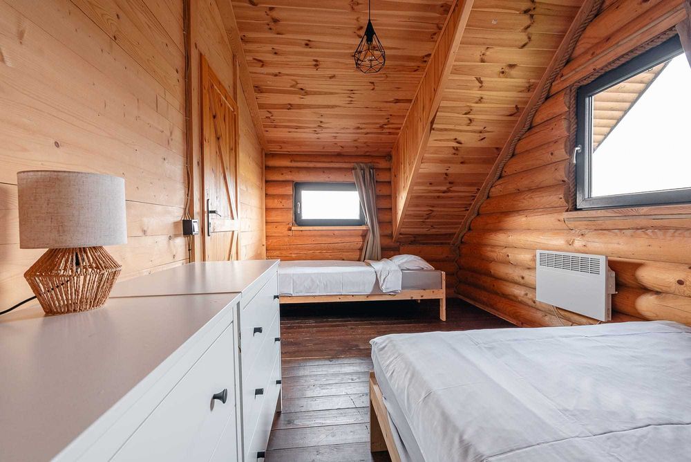 Domek na urodziny nad jeziorem sauna jacuzzi Warmia Mazury plaża