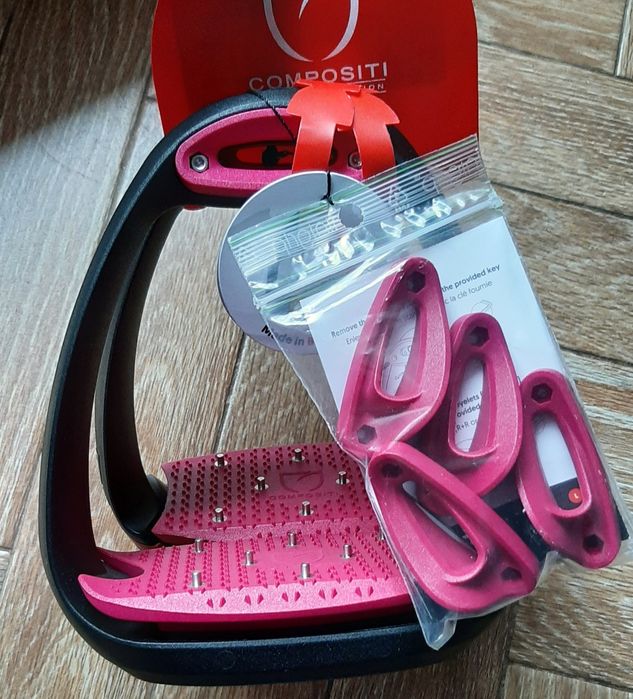 Nowe strzemiona EOLE PRO Compositi z kolcami malinowe