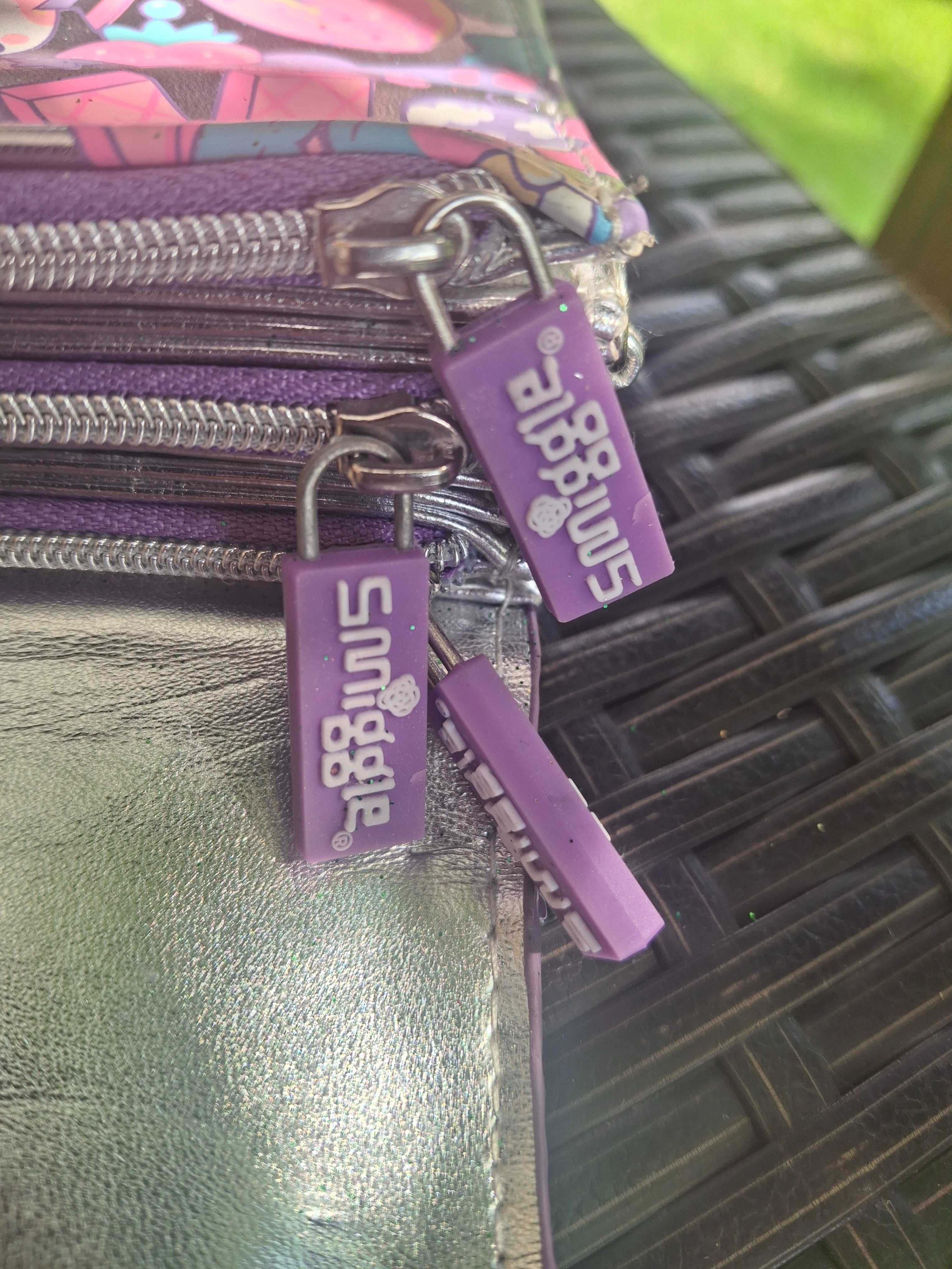 Piekna torebka i jednoczesnie portfel.Z Anglii firmy smiggle.