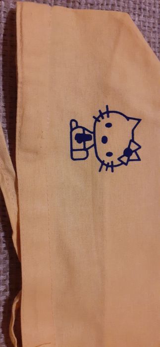 Żółty czepek z nadrukiem, bawełniany, nowy