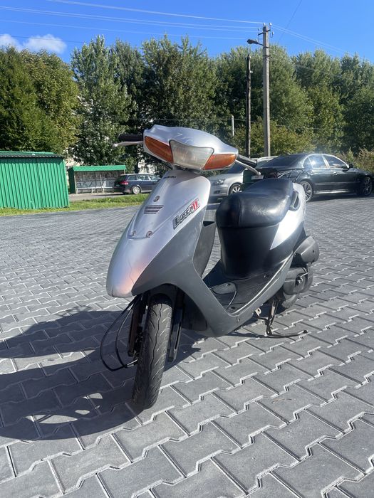 Скутер Suzuki Lets 2 стоковий