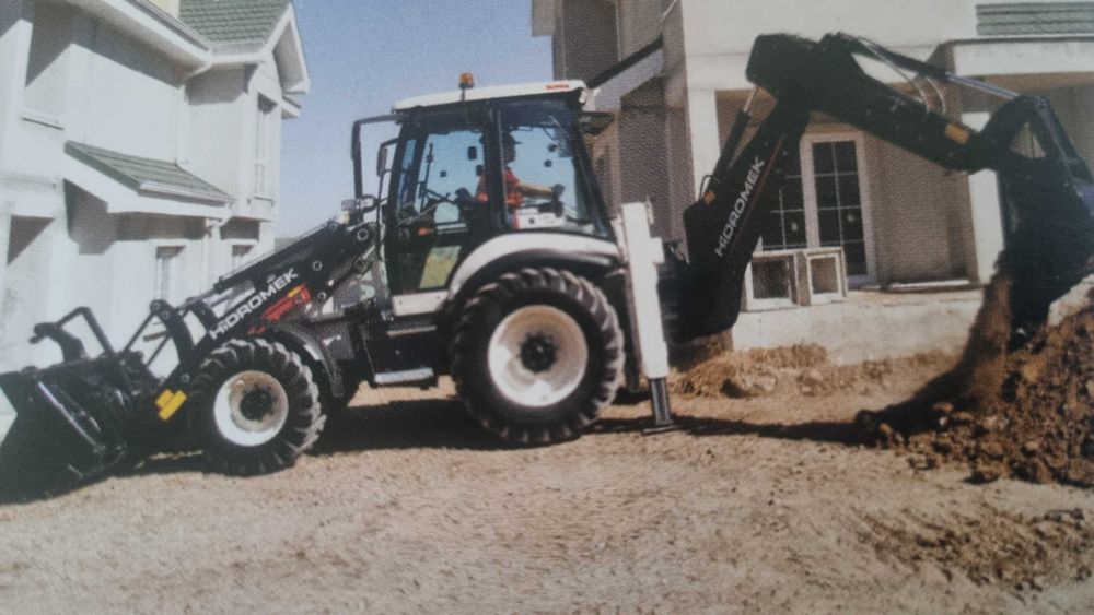 Послуги трактора (экскаватор навантажувач)