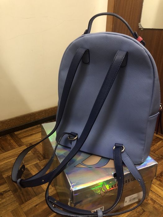 Mochila Tous com pega de mão e alcas com bolso exterior e tres interio