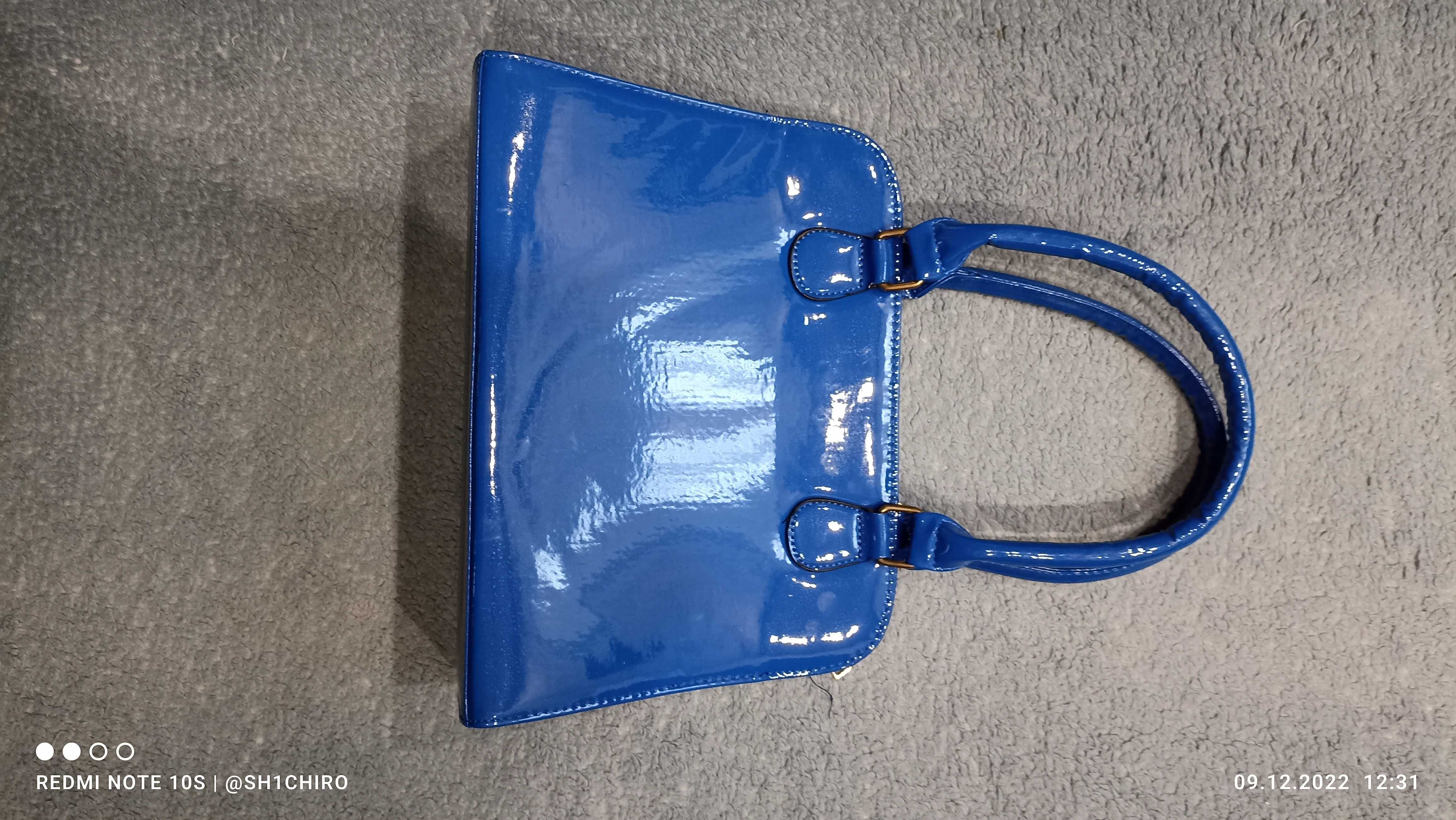Жіноча блакитна сумочка