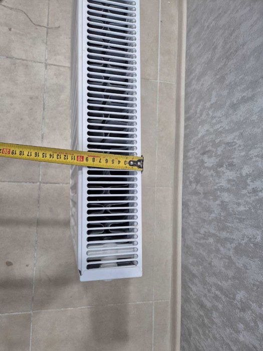 Продам металлический радиатор 70см в использовании НЕБЫЛ