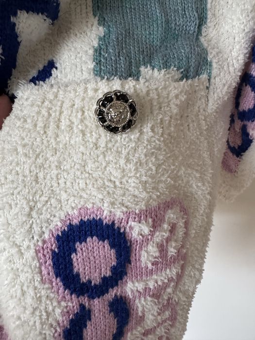 Kardigan Chanel………