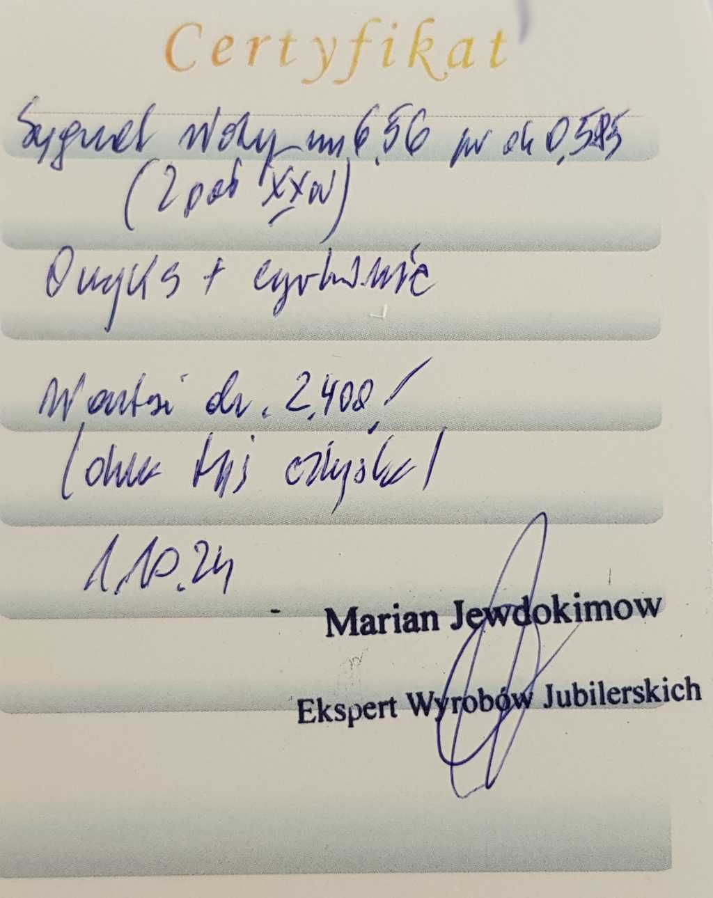 Złoty sygnet zdobiony onyksem oraz cyrkoniami - II połowa XX wieku