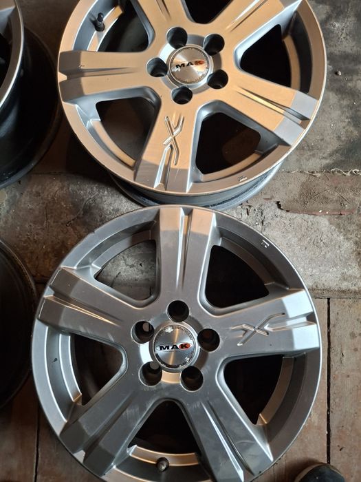 Четире легкосплавних диска на 15 МАК на Шкода Октавию.кода