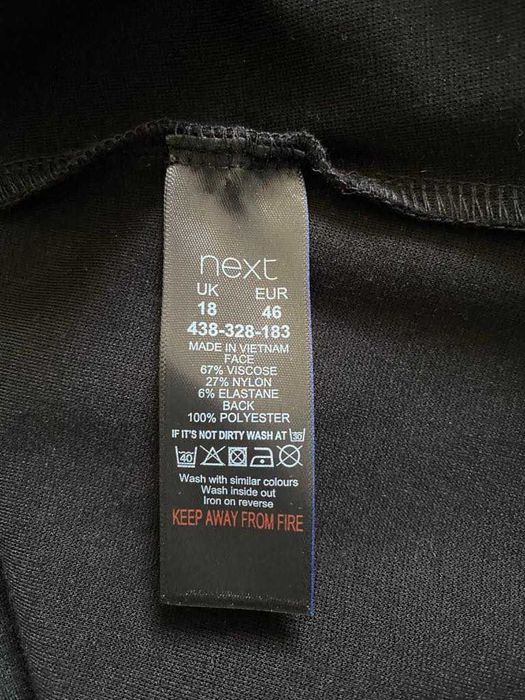 Next sukienka czarna dołem falbana duża 18 biurowa wizytowa