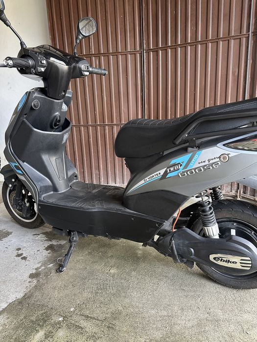 Moto eletroca com documento