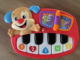 Zabawka pianinko piesek Fisher price