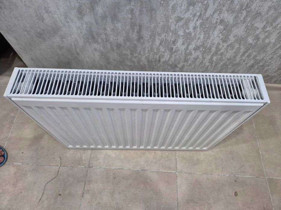 Продам металлический радиатор 70см в использовании НЕБЫЛ