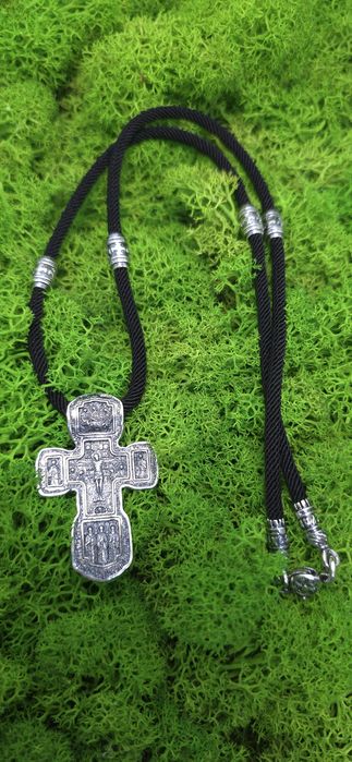 Срібний хрест на шовковому шнурку