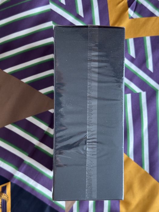 Kilian woman in gold