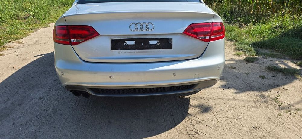 ZDERZAK TYLNY TYŁ AUDI A4 B8 SEDAN S-LINE PDC LX7W