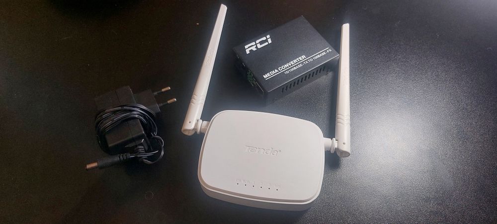 Лот мережевого обладнання (роутер Tenda N301 + медіаконвертор RCI)