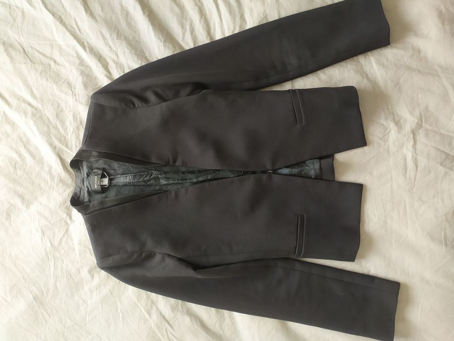 Чорний піджак на дівчинку