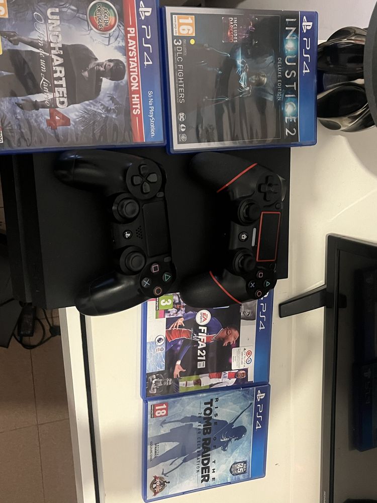 Ps4+dois comados + jogos