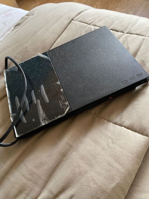 Playstation 2 + comandos + buzz