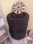 Opony zimowe 215/60/R16 z felgami 5x115 i kołpakami Opel Astra