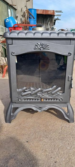 Vendo salamandra muito antiga em ferro  fundido