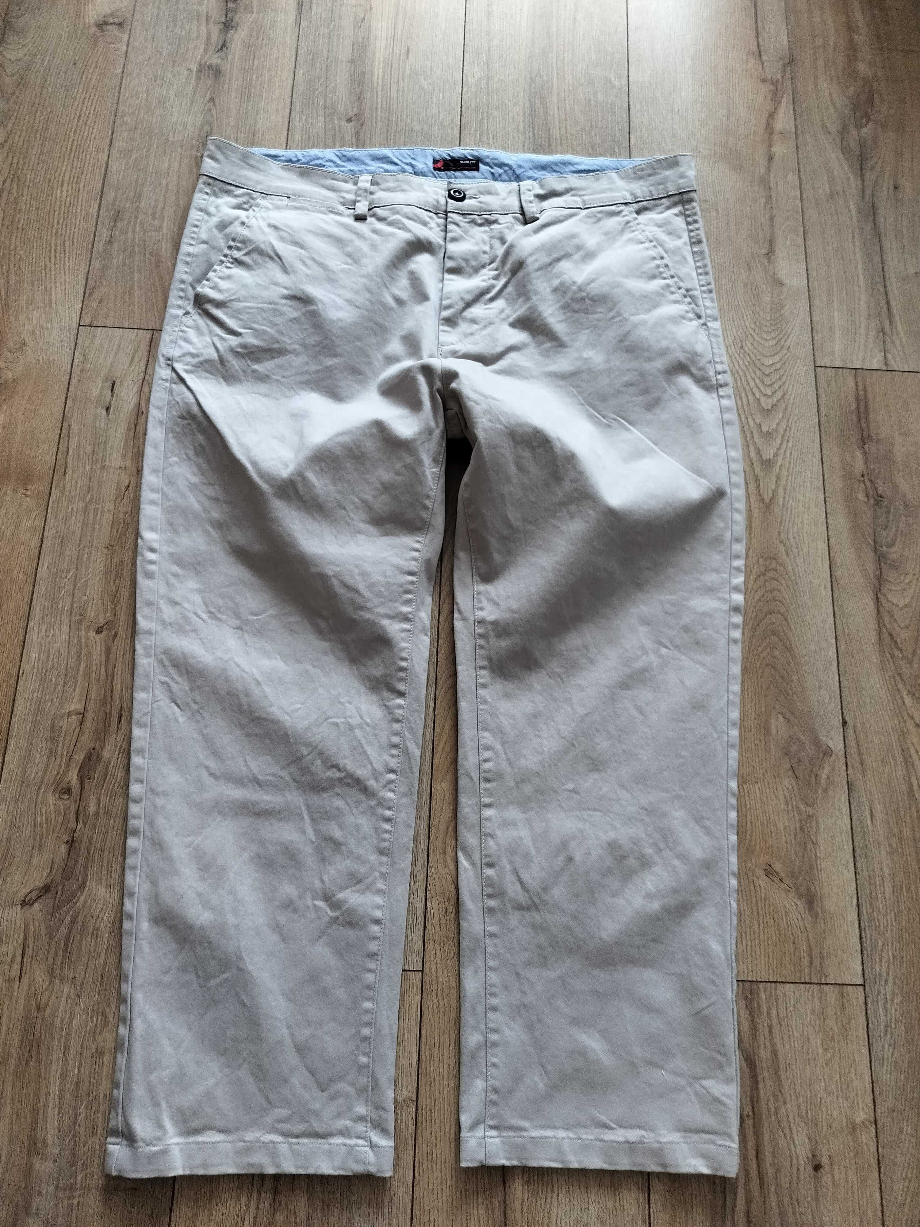Spodnie męskie 42/32 slim fit oryginalne beżowe elastyczne pas110