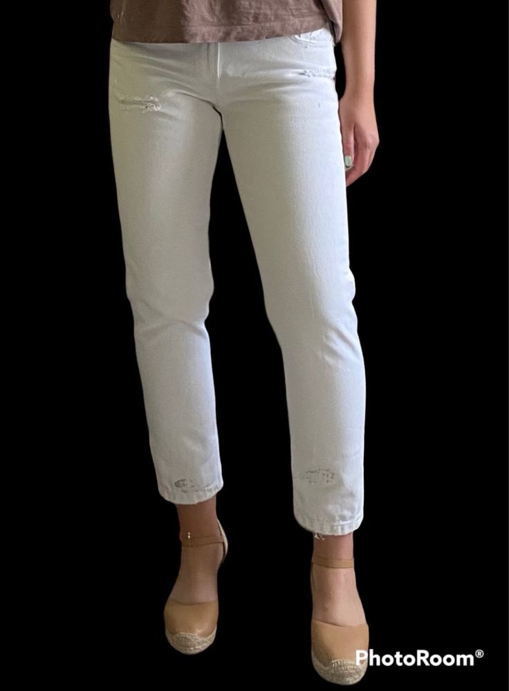 Białe jeansy z rozdarciami Cropp 38