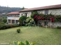 Quinta com casa reconstruída e terreno a 20Km de Braga