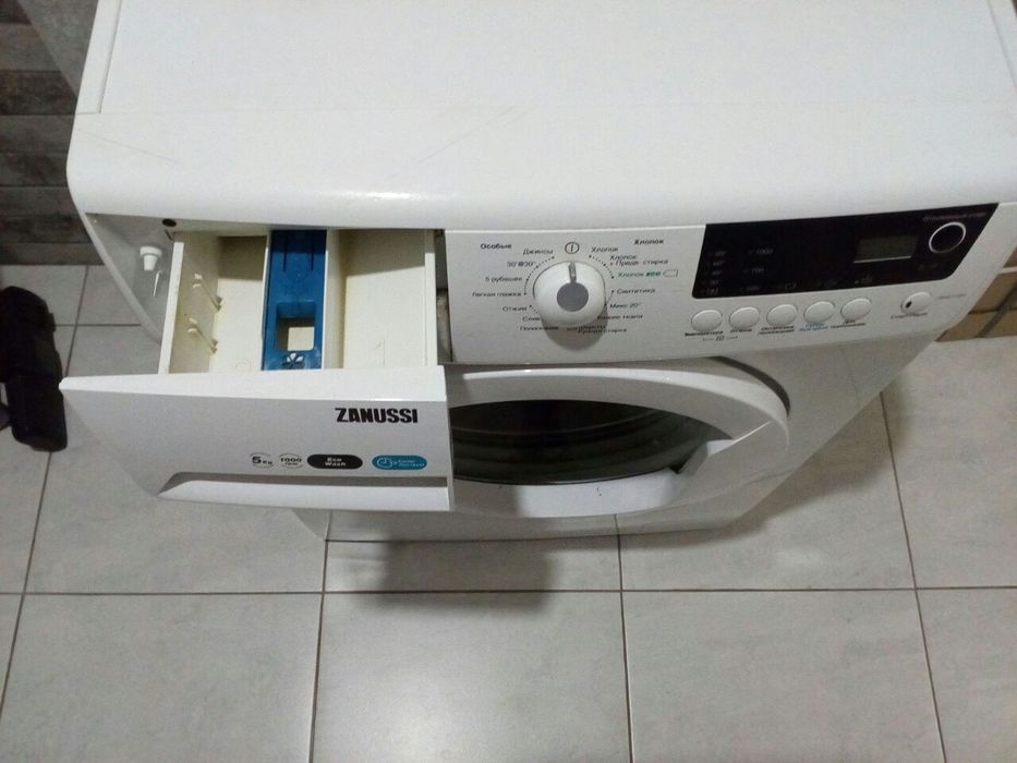 Пральна машина .