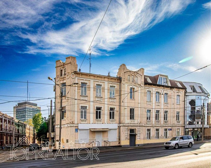 Продам 4-пов. торгово-офісний центр на пр. Героїв Харкова 50/52