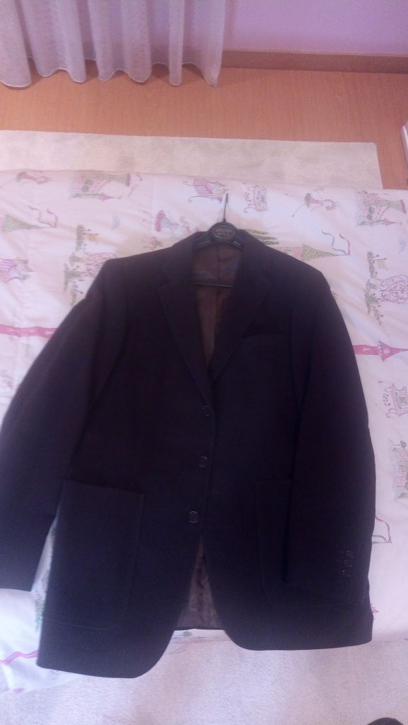 Blazer bonito conforme as fotos