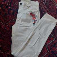 Białe jeansy Esmara 38