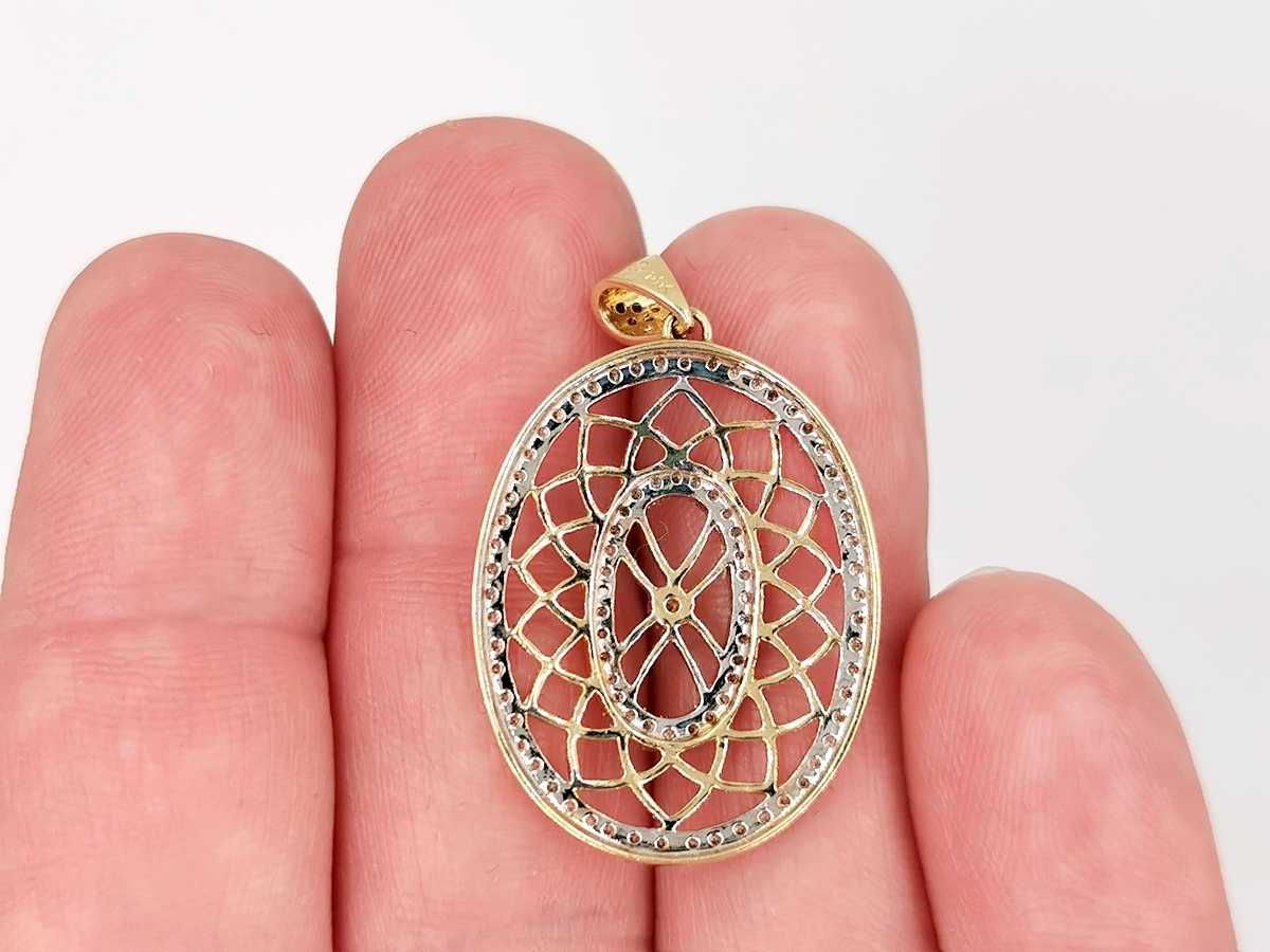 wisiorek złoto 14K 585 diamenty 0,28 ct 4,04 g certyfikat