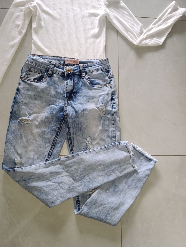 Spodnie jeansy damskie dziury jeans niebieskie błękitne dziury S 36