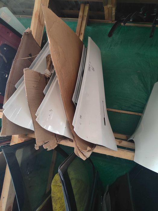 Двері передні задні голі, в зборі Tesla Model Y 2020-2024